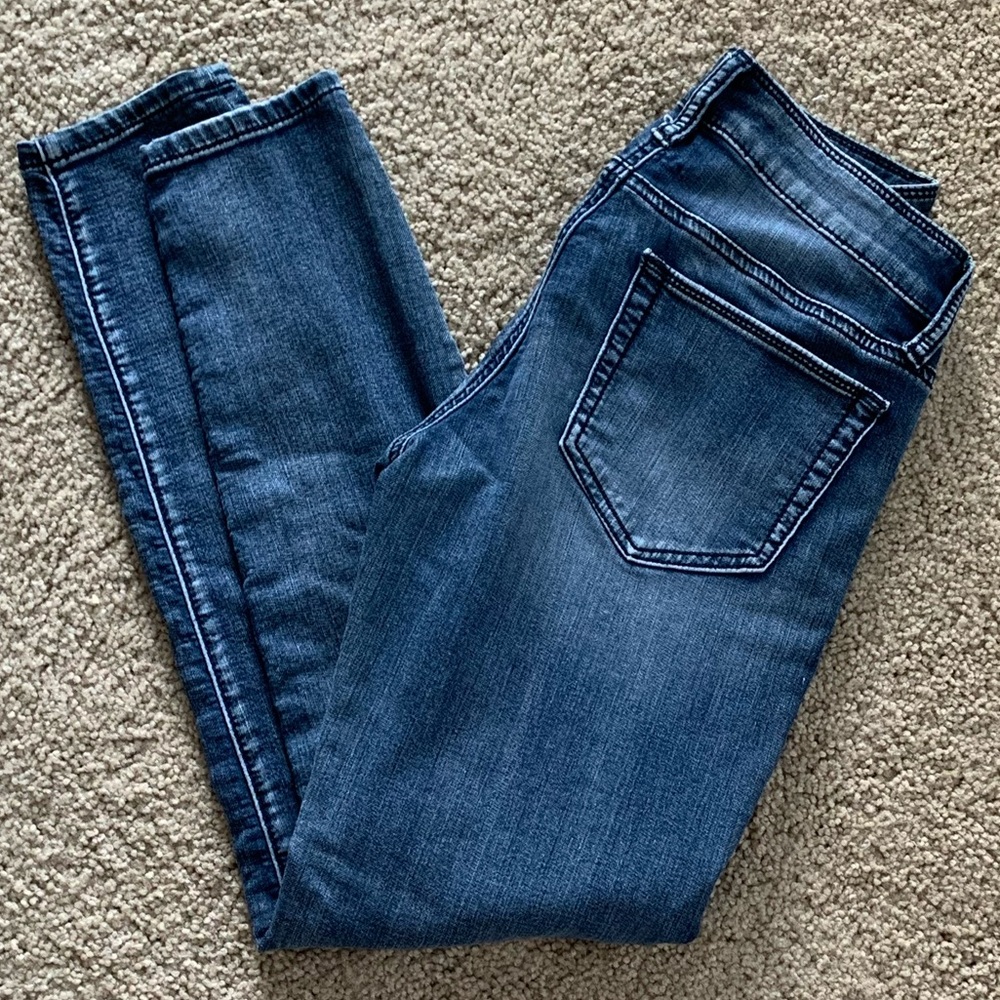 Buckle Skinny Jeans